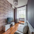 Hoeveel rollen behang heb je nodig voor een muur van 4 bij 2,6 meter