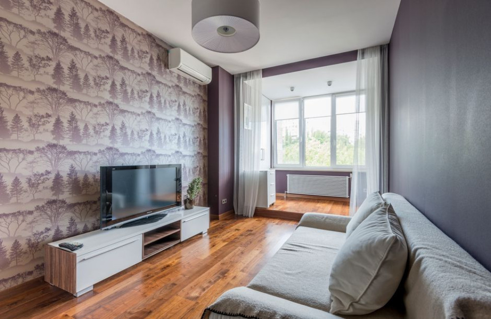 Hoeveel rollen behang heb je nodig voor een muur van 4 bij 2,6 meter